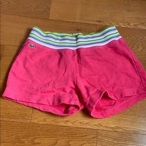 100% cotton pink Lacoste shorts with rainbow trim